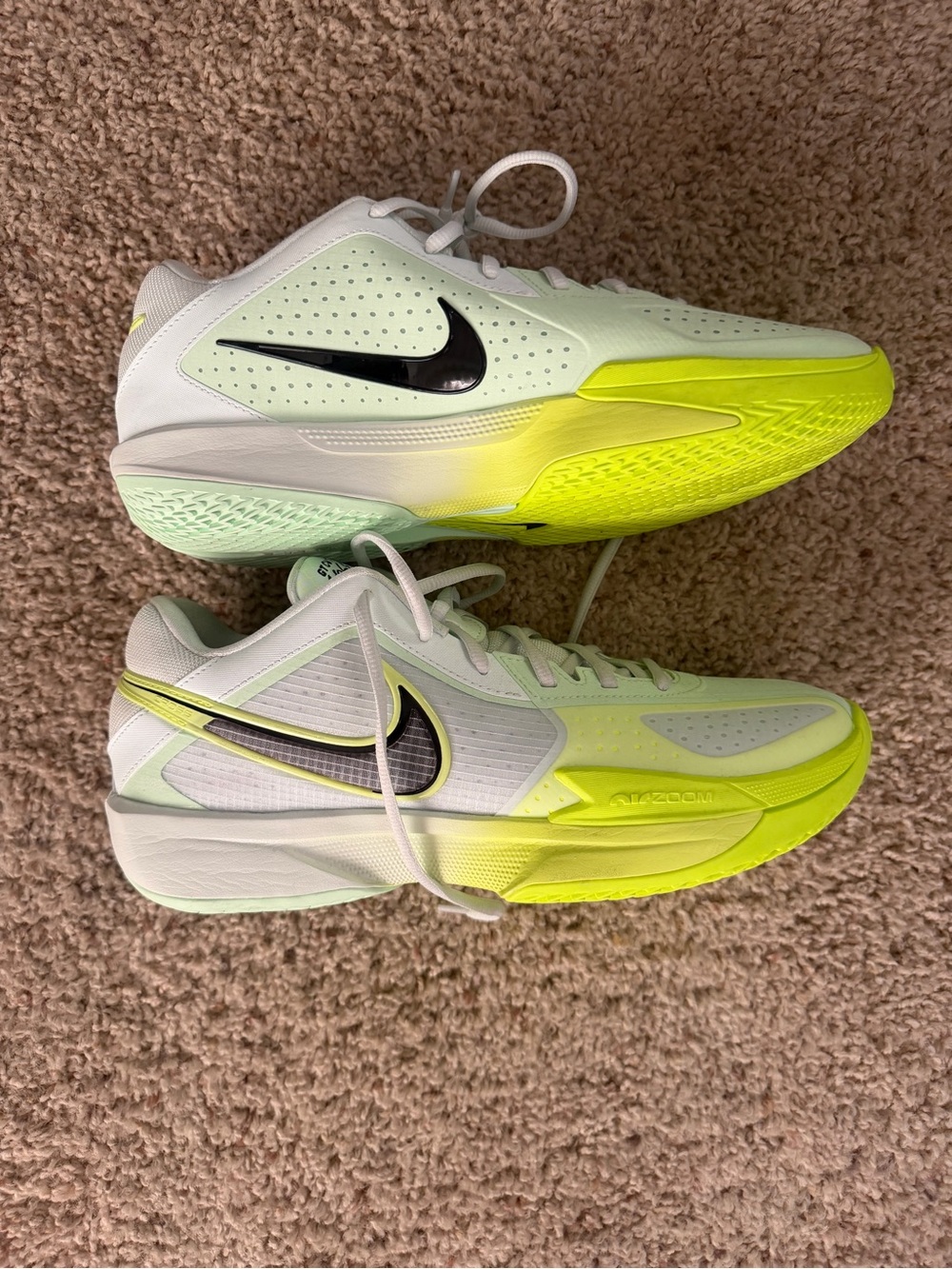 These are the Nike Air Zoom G.T. Cut Academy in the "Volt" colorway